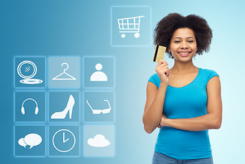 Image showing afro american woman with credit card and icons