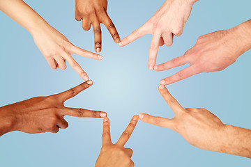 Image showing group of international people showing peace sign