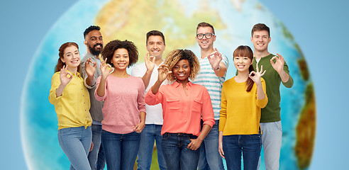 Image showing international group of happy people showing ok