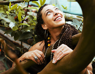 Image showing Young cute smiling real stylish dressed woman in green palm park smiling, resting, enjoing, lifestyle outside concept