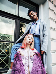 Image showing Two teenage girls infront of university building smiling, having fun traveling europe, lifestyle people concept 