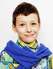 Image showing young pretty little cute boy kid wondering, posing emotional face isolated on white background, gesture happy smiling close up, lifestyle real people concept