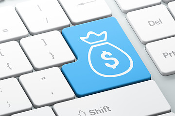 Image showing Currency concept: Money Bag on computer keyboard background