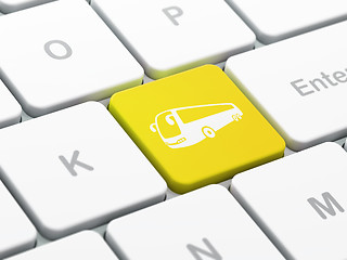 Image showing Tourism concept: Bus on computer keyboard background