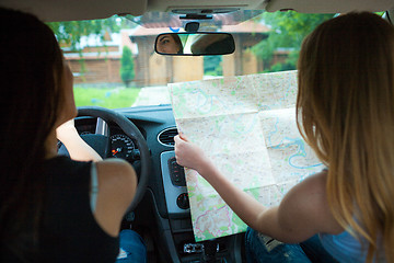 Image showing Two girls traveling in a car