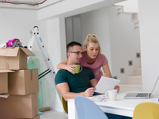 Image showing Young couple moving in a new home