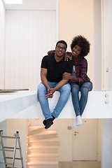 Image showing couple having break during moving to new house