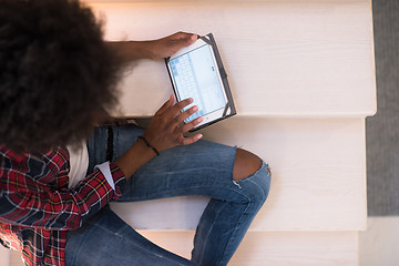 Image showing black woman using her electronic tablet