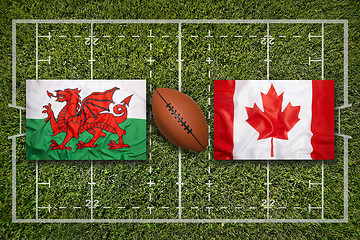 Image showing Wales vs. Canada flags on rugby field