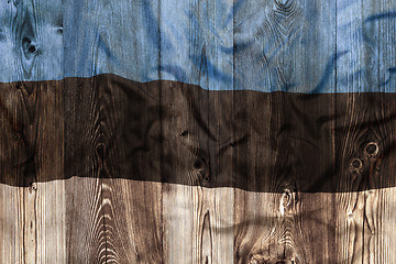 Image showing National flag of Estonia, wooden background