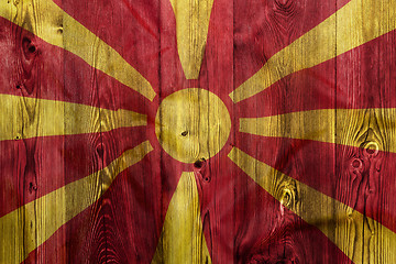 Image showing National flag of Macedonia, wooden background