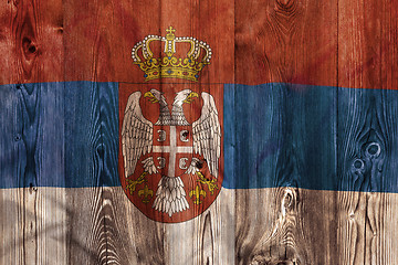 Image showing National flag of Serbia, wooden background