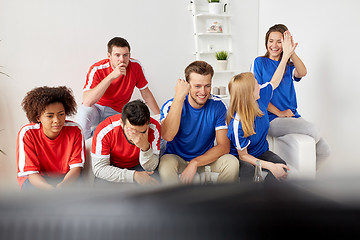 Image showing friends or football fans watching soccer at home