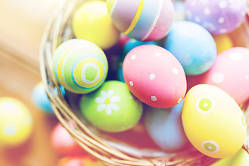 Image showing close up of colored easter eggs in basket