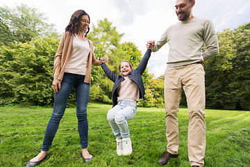 Image showing happy family walking in summer park and having fun