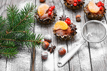 Image showing Christmas cupcake with berries