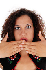 Image showing Shocked woman with hand over mouth.