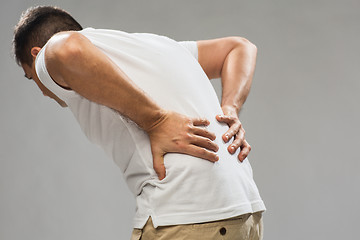 Image showing close up of man suffering from backache