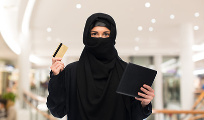 Image showing woman in hijab with tablet pc and credit card