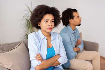 Image showing unhappy couple having argument at home