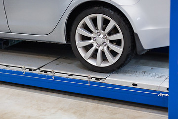 Image showing car on lift at repair station
