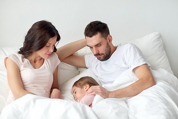 Image showing family sleeping in bed at home