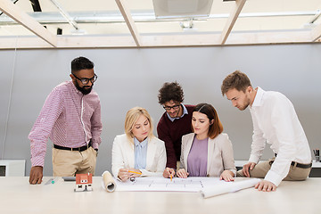 Image showing business team discussing house project at office