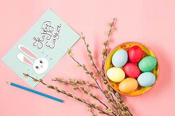 Image showing The top view of easter on pink table office workplace