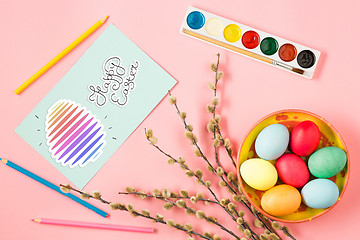 Image showing The top view of easter on pink table office workplace