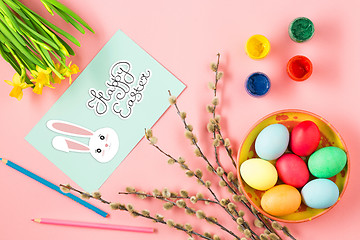 Image showing The top view of easter on pink table office workplace