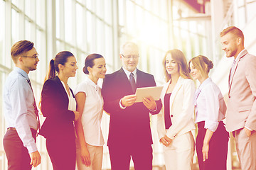 Image showing business people with tablet pc computer at office