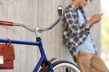 Image showing man with fixed gear bicycle on street