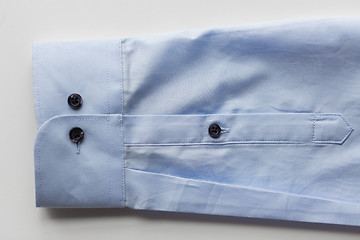 Image showing close up of blue shirt sleeve