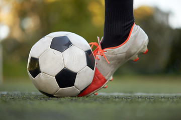 Image showing soccer player playing with ball on football field