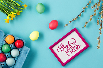 Image showing The top view of easter on blue table office workplace