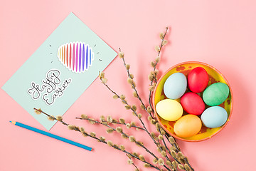 Image showing The top view of easter on pink table office workplace