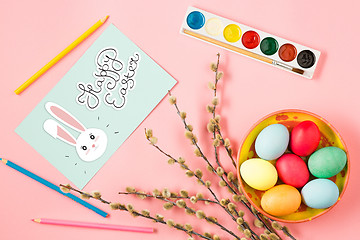 Image showing The top view of easter on pink table office workplace