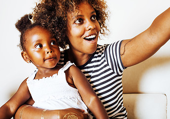 Image showing adorable sweet young afro-american mother with cute little daugh