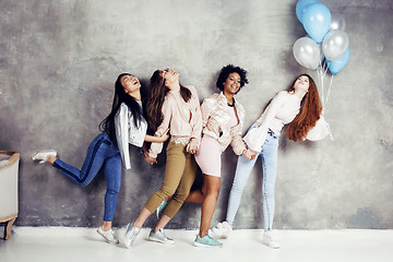 Image showing Lifestyle and people concept: young pretty diversity nations woman with different age children celebrating on birth day party together happy smiling, making selfie. African-american, asian and caucasi