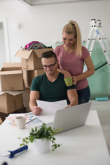 Image showing Young couple moving in a new home