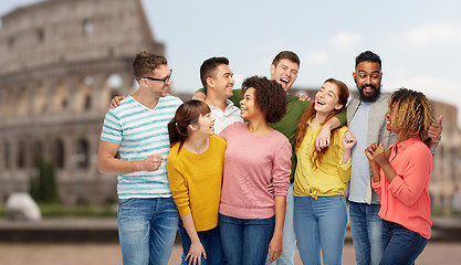 Image showing international group of happy people over coliseum