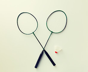 Image showing close up of badminton rackets with shuttlecock