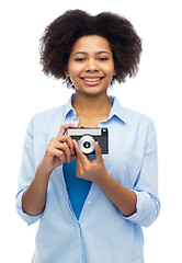 Image showing happy african american woman with film camera