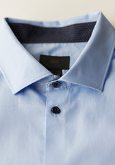 Image showing close up of blue shirt collar