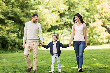 Image showing happy family walking in summer park