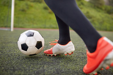 Image showing soccer player playing with ball on football field