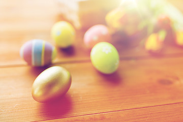 Image showing close up of colored easter eggs and flowers