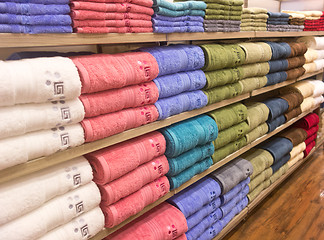 Image showing towels on shelves