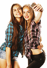 Image showing cute teenage girls making selfie isolated