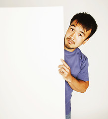 Image showing pretty cool asian man holding empty white plate smiling